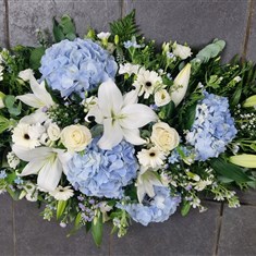 Blue and white luxury casket spray